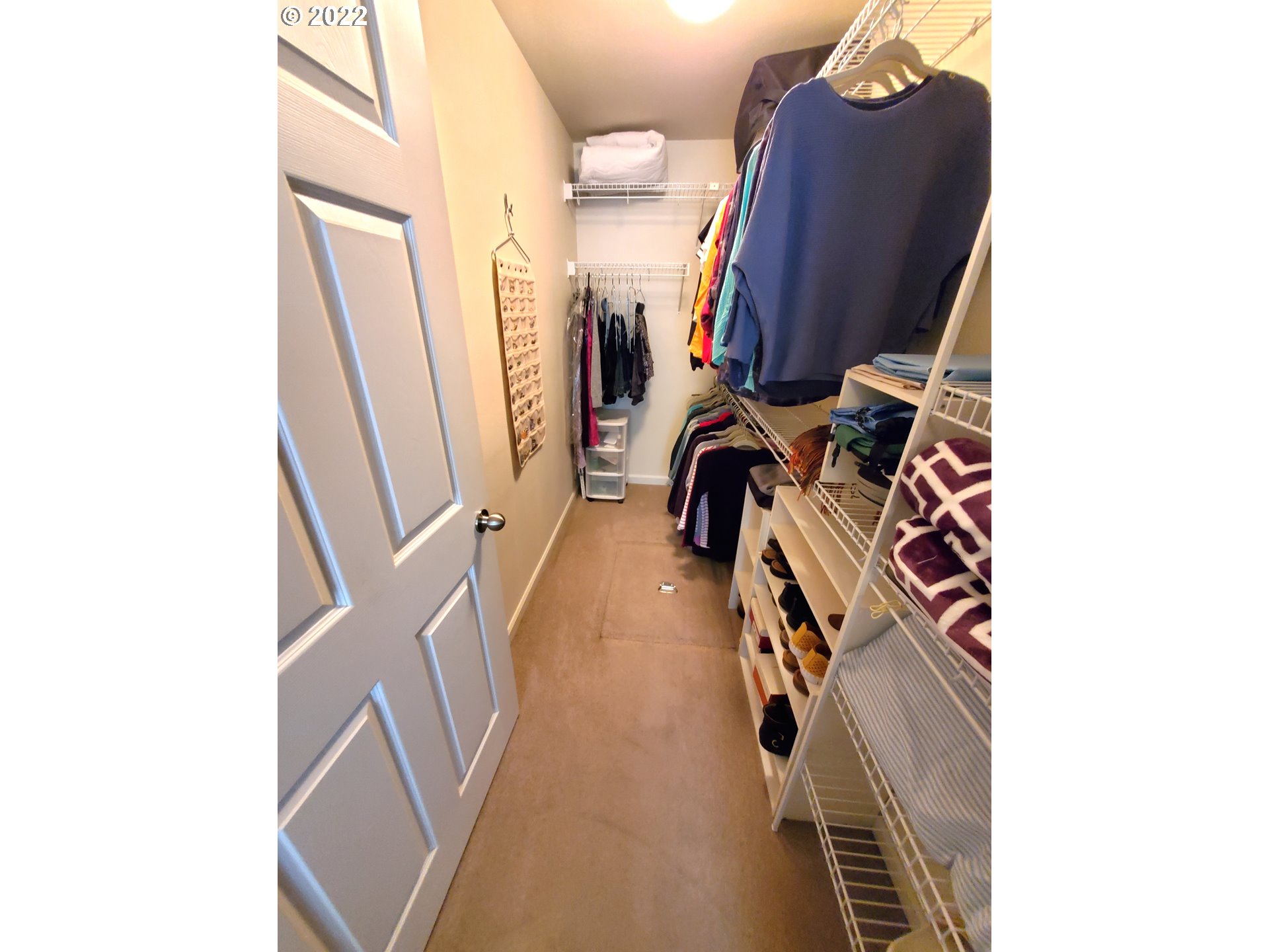 4520 Southwest 11th Street Gresham, OR 97080 - Photo 19 of 30 a view of a hallway with mirror and furniture
