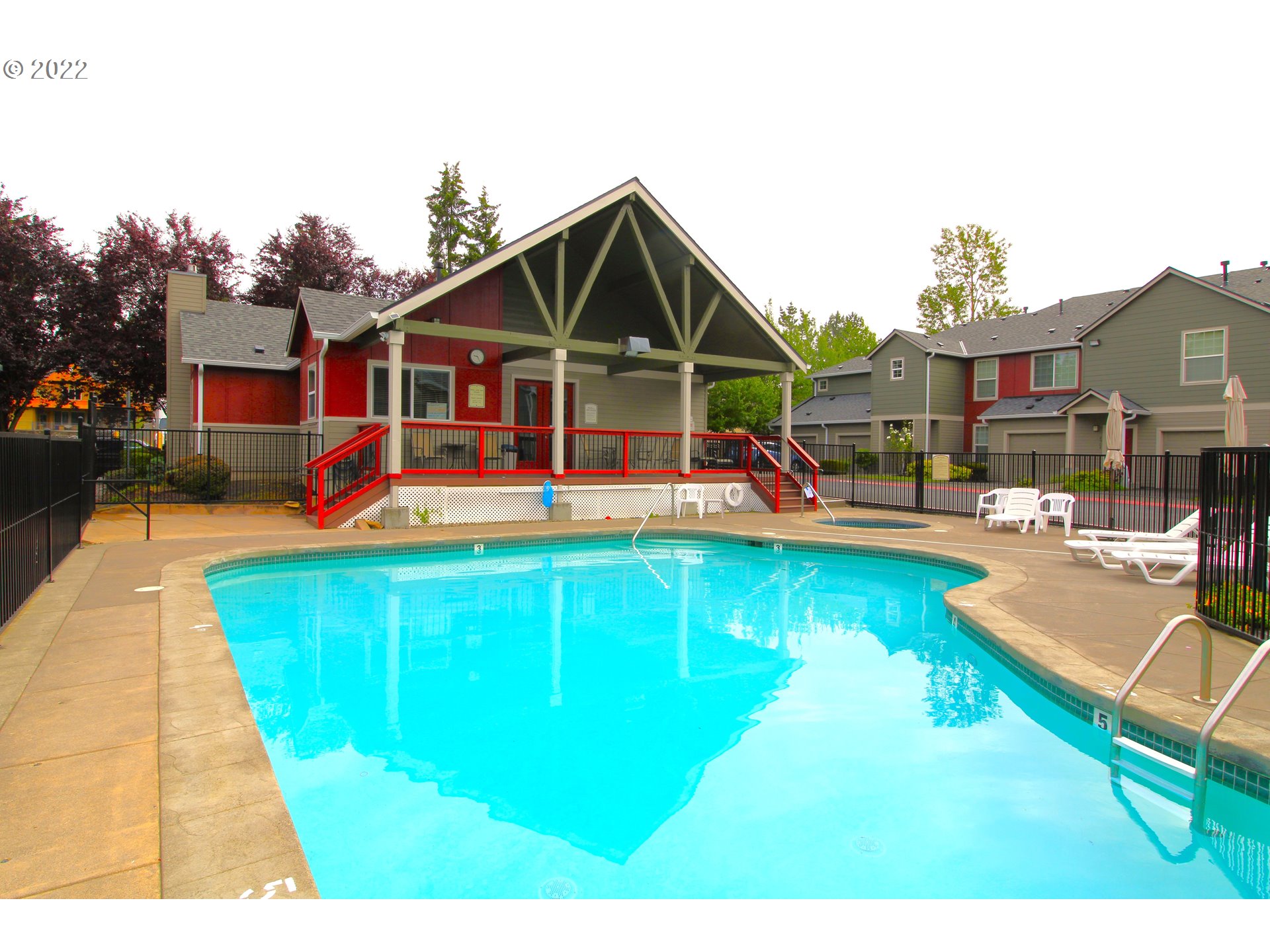4520 Southwest 11th Street Gresham, OR 97080 - Photo 28 of 30 a view of a house with swimming pool