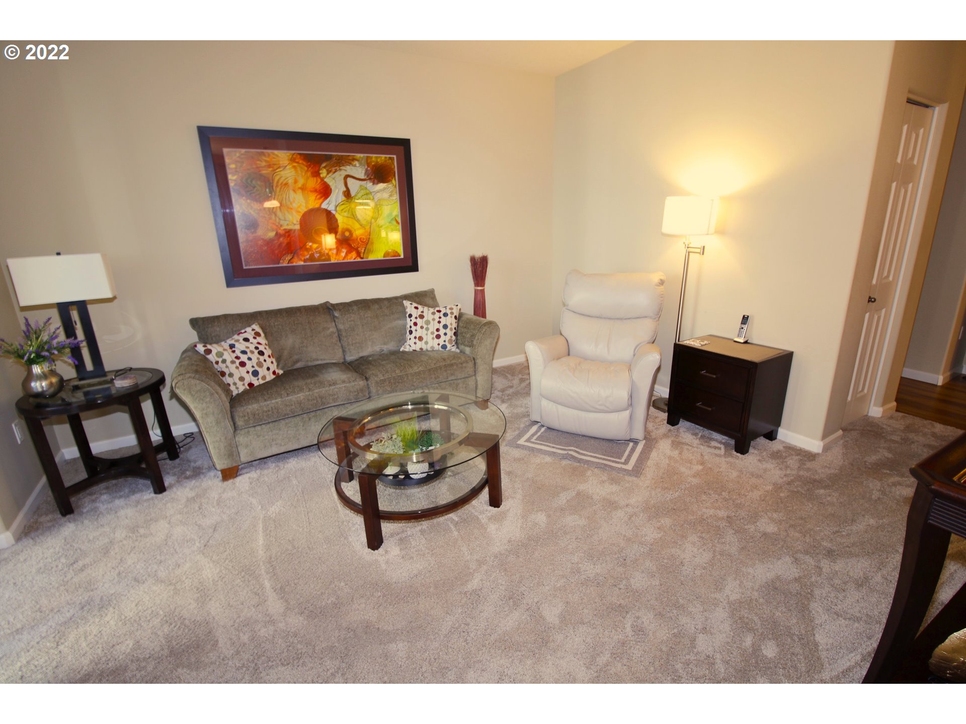 4520 Southwest 11th Street Gresham, OR 97080 - Photo 9 of 30 a living room with furniture and a flat screen tv