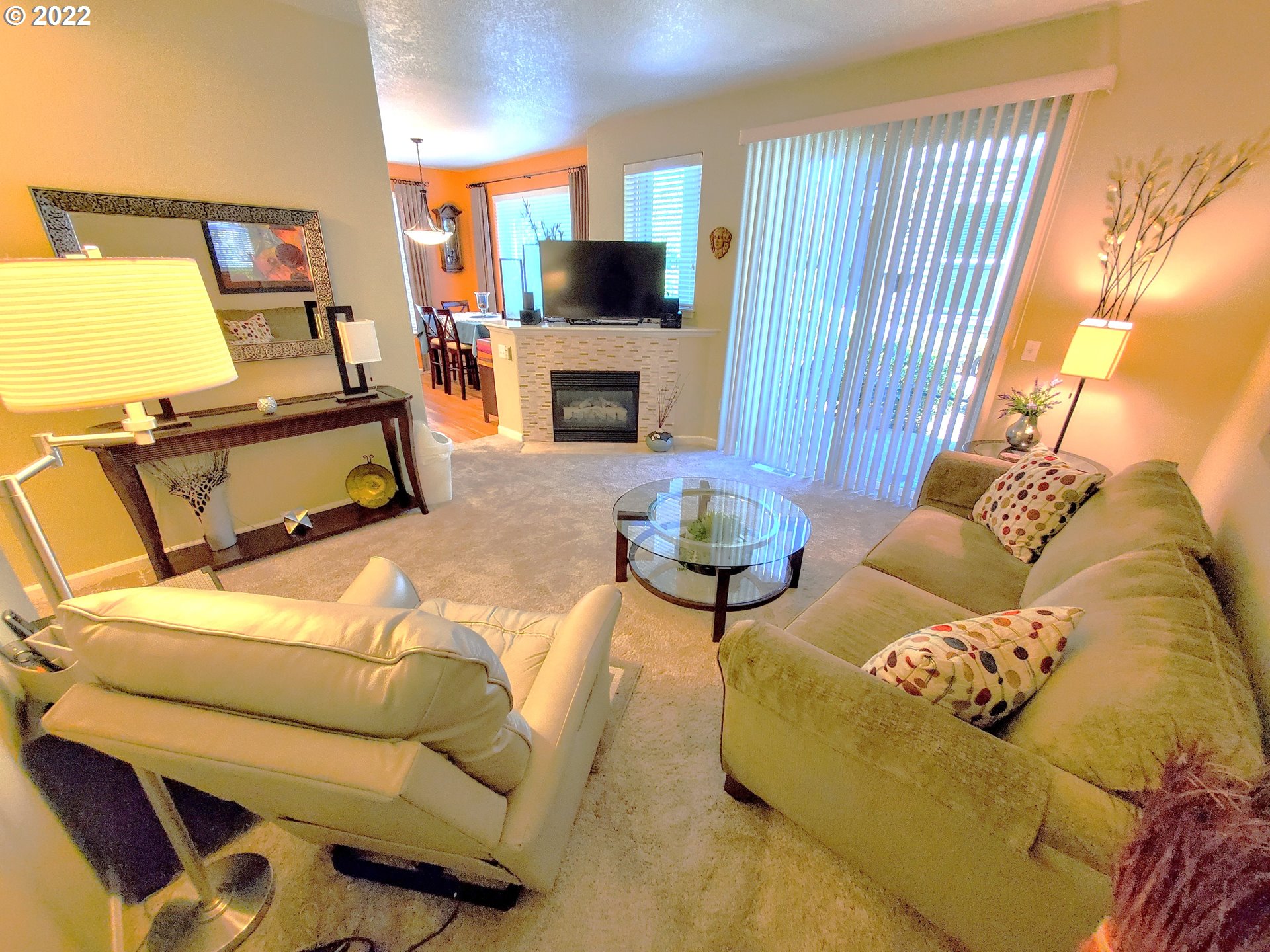 4520 Southwest 11th Street Gresham, OR 97080 - Photo 10 of 30 a living room with furniture fireplace and flat screen tv
