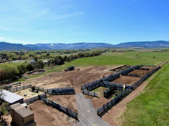 an aerial view of a house with a garden