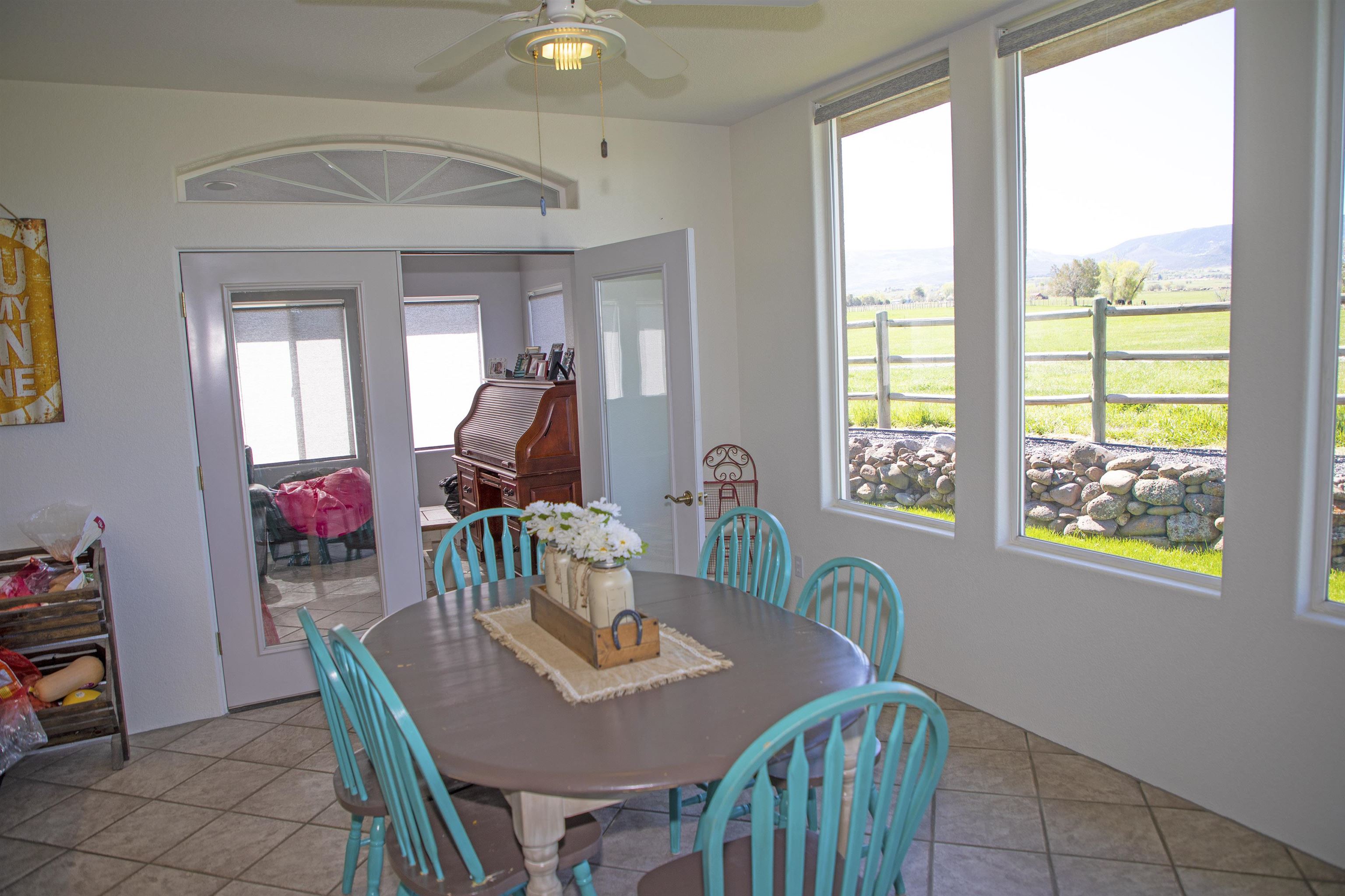 57178 Oe Road Collbran, CO 81624 - Photo 32 of 41 a dining room with furniture and wooden floor