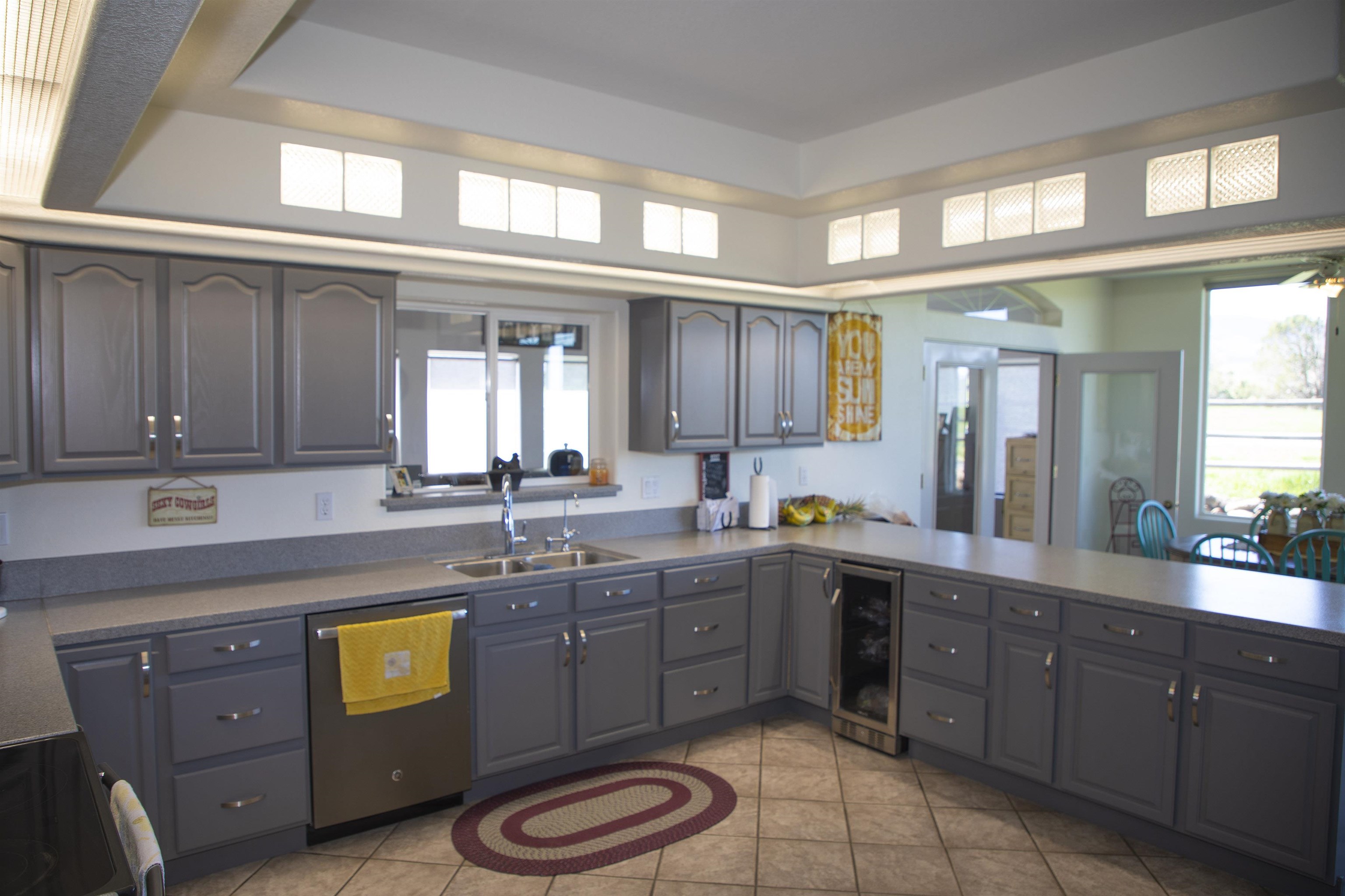 57178 Oe Road Collbran, CO 81624 - Photo 36 of 41 a spacious bathroom with a granite countertop sink mirror and toilet
