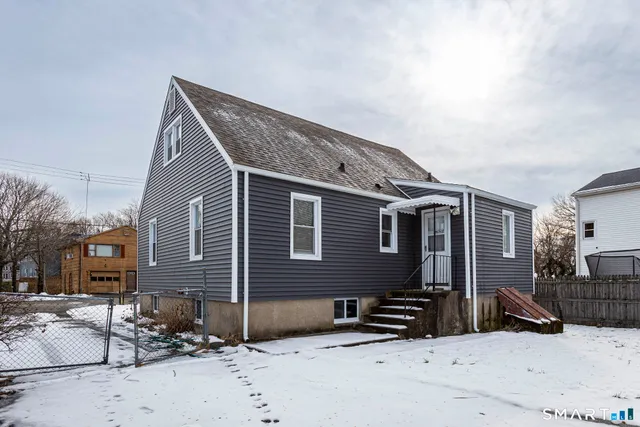 a front view of house with yard