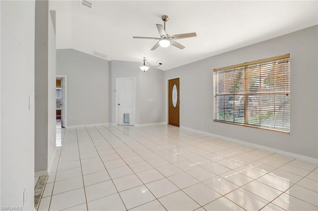 18250 Maple Road Fort Myers, FL 33967 - Photo 6 of 26 a view of an empty room with a window