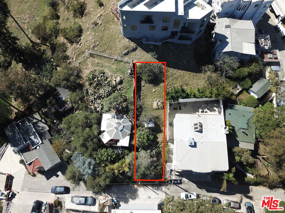 an aerial view of residential house with outdoor space