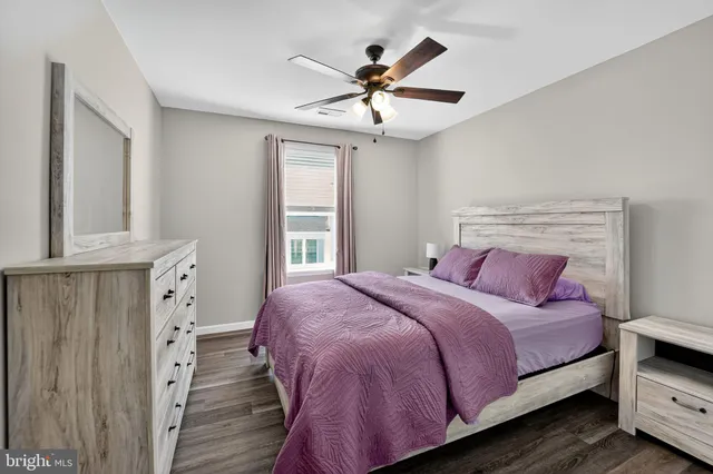 a bathroom with double vanity sink a vanity and a mirror