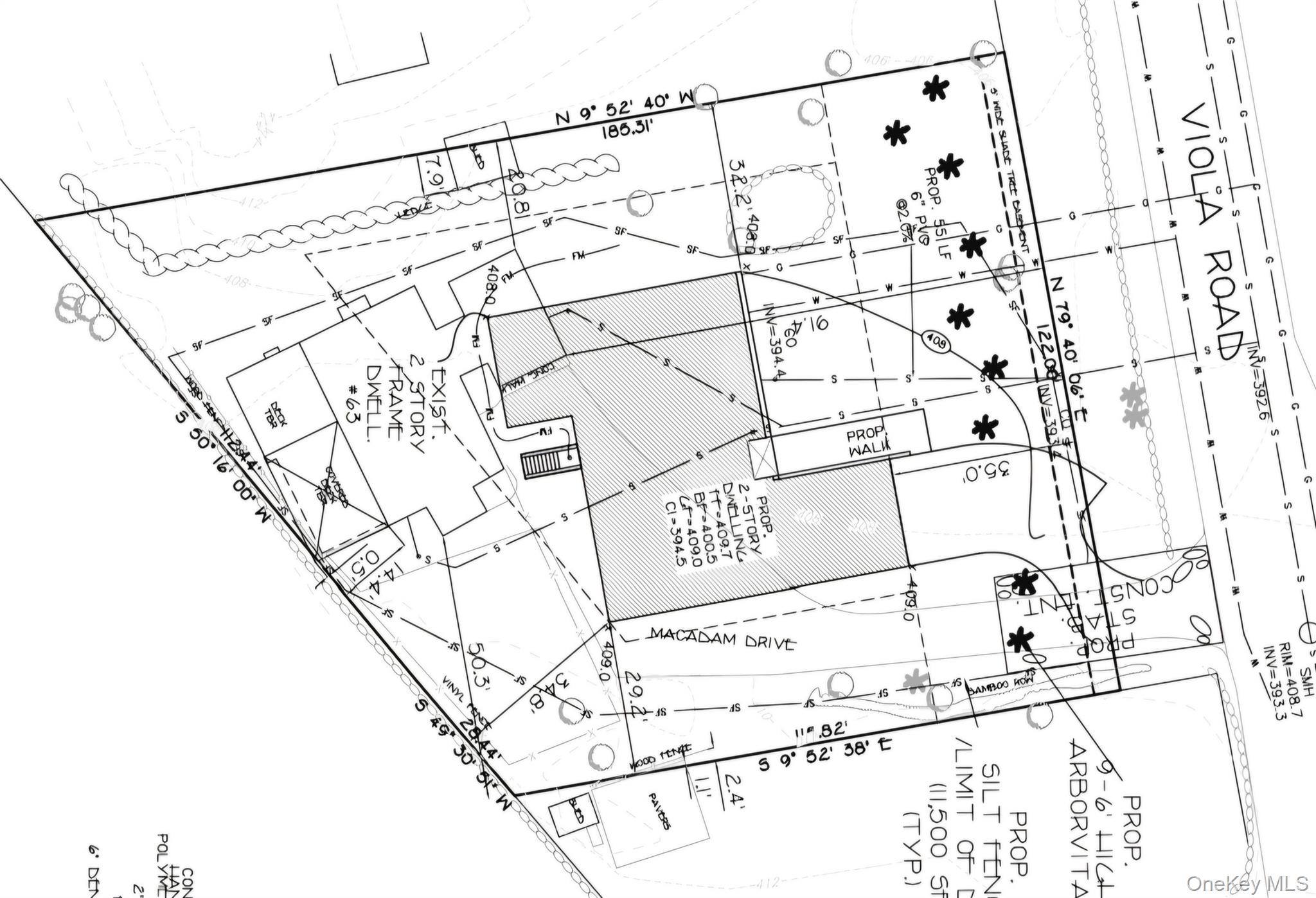 63 Viola Road Montebello, NY 10901 - Photo 7 of 8 a black and white photo of a book