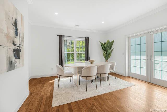 1 Kewanee Road New Rochelle, NY 10804 - Photo 6 of 36 a dining room with furniture and wooden floor