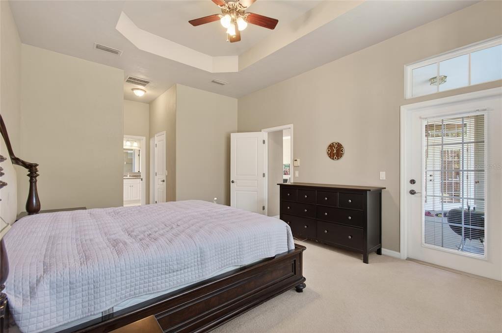 3762 Southwest 74th Drive Gainesville, FL 32608 - Photo 17 of 37 a bedroom with a bed and a dresser