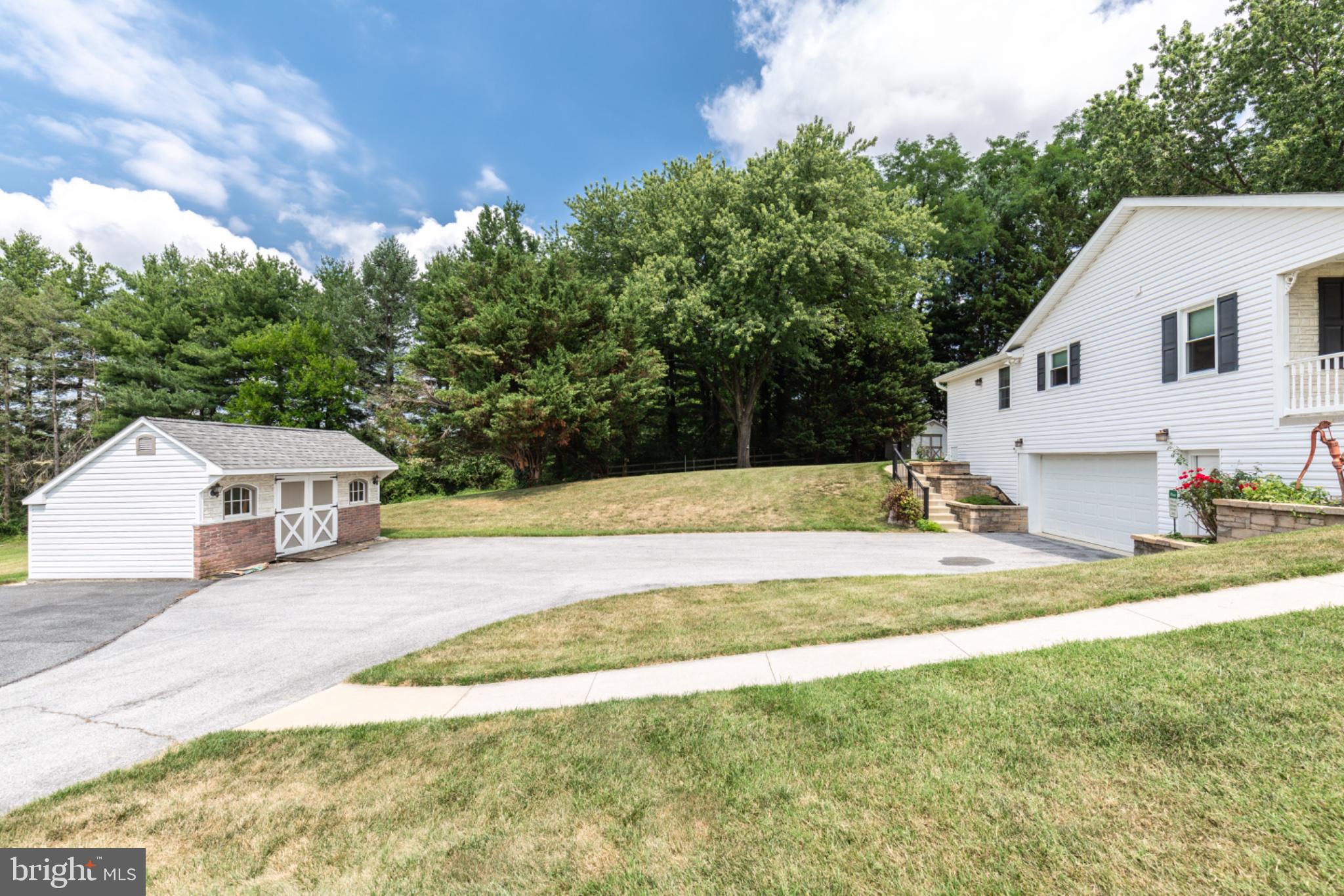 544 Uniontown Road Westminster, MD 21158 - Photo 45 of 51 Charming home with lush greenery.