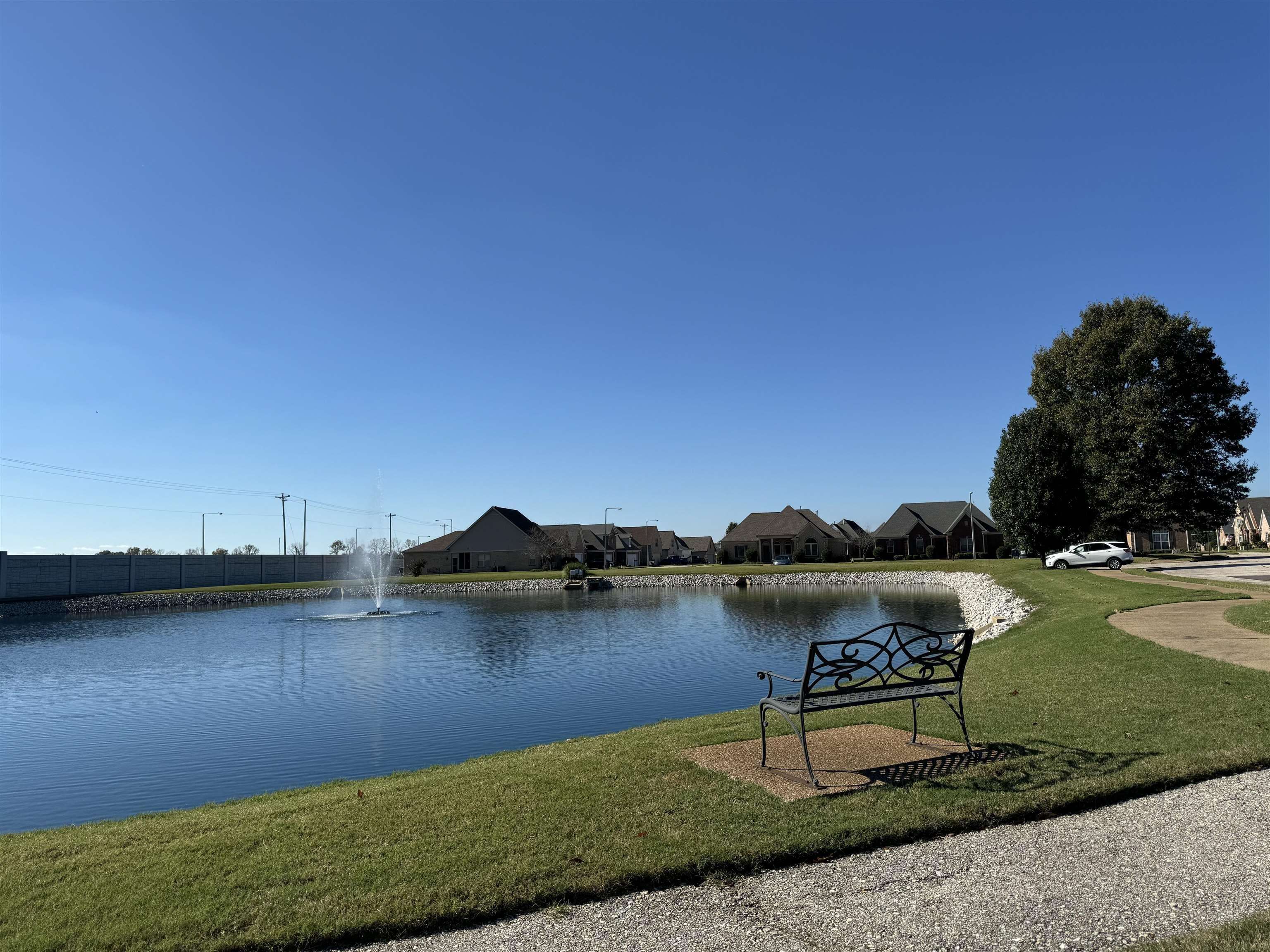 5553 Shipp Road Millington, TN 38053 - Photo 8 of 8 a view of a lake with lawn chairs