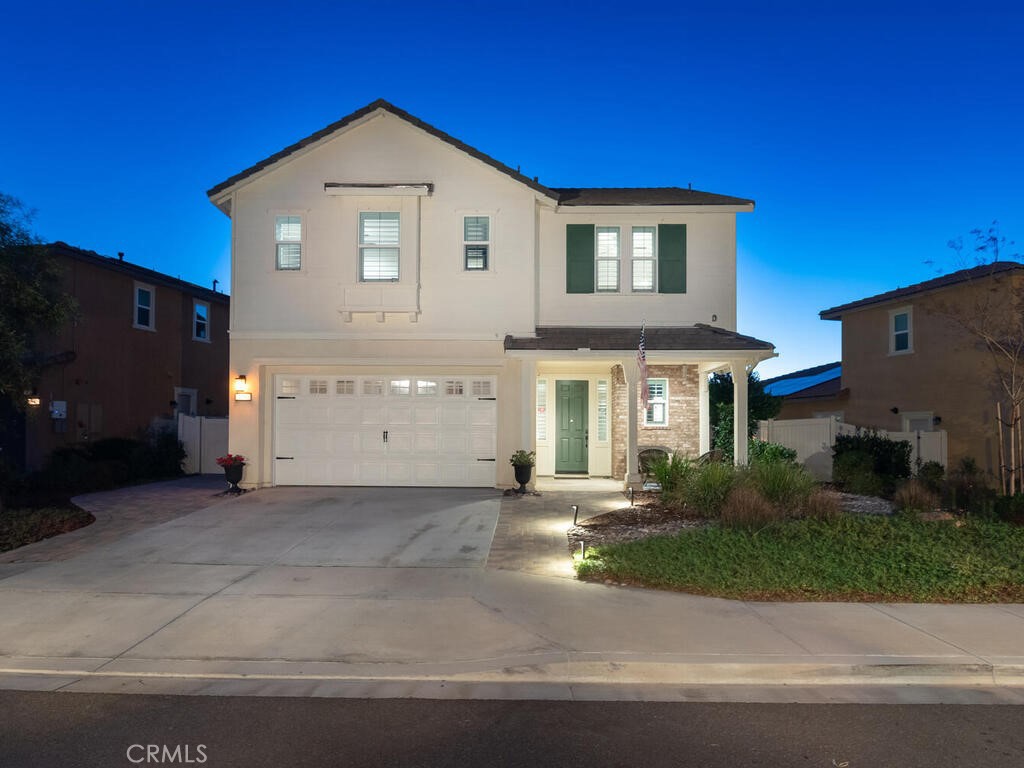 374 Ventasso Way Fallbrook, CA 92028 - Photo 1 of 42 a front view of a house with a yard and garage
