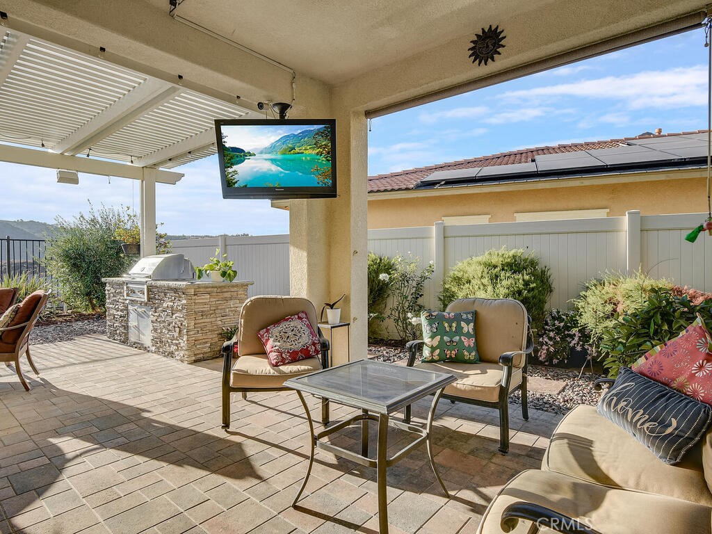 374 Ventasso Way Fallbrook, CA 92028 - Photo 14 of 42 a outdoor living space with furniture and garden view