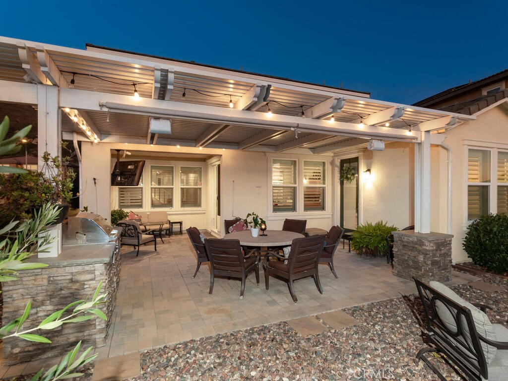 374 Ventasso Way Fallbrook, CA 92028 - Photo 31 of 42 a view of a patio with table and chairs