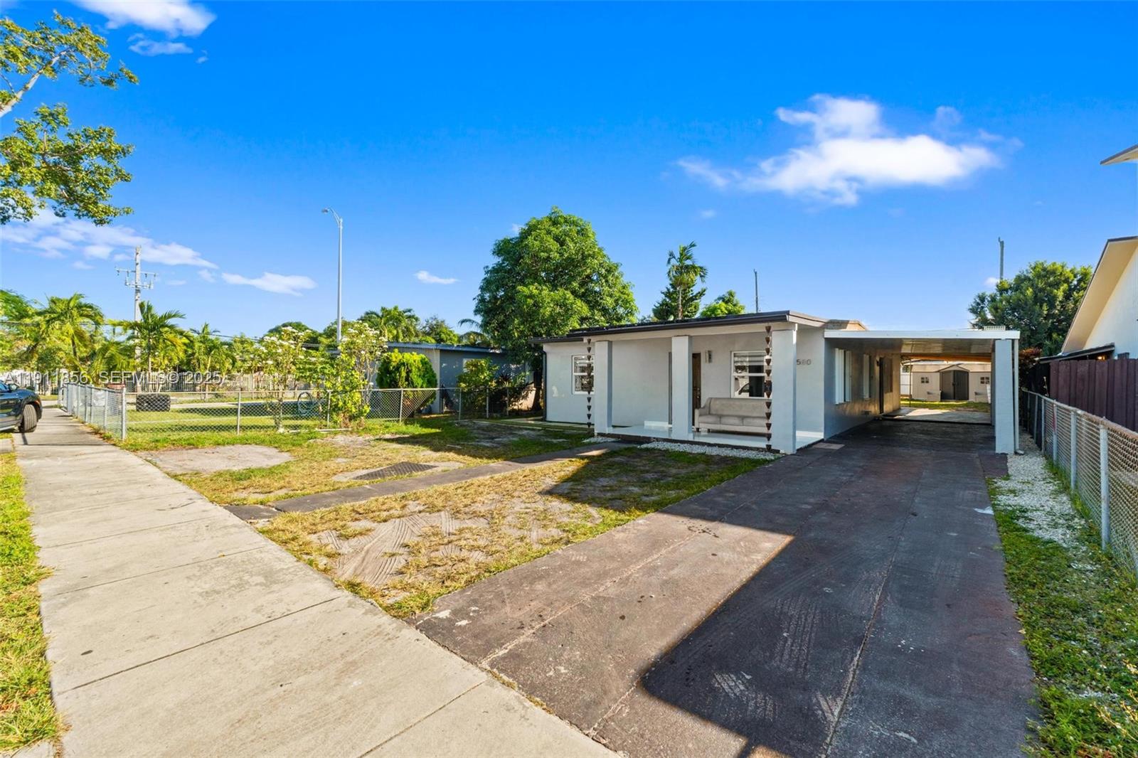 580 East 44th Street Hialeah, FL 33013 - Photo 2 of 41 a view of backyard of house with green space