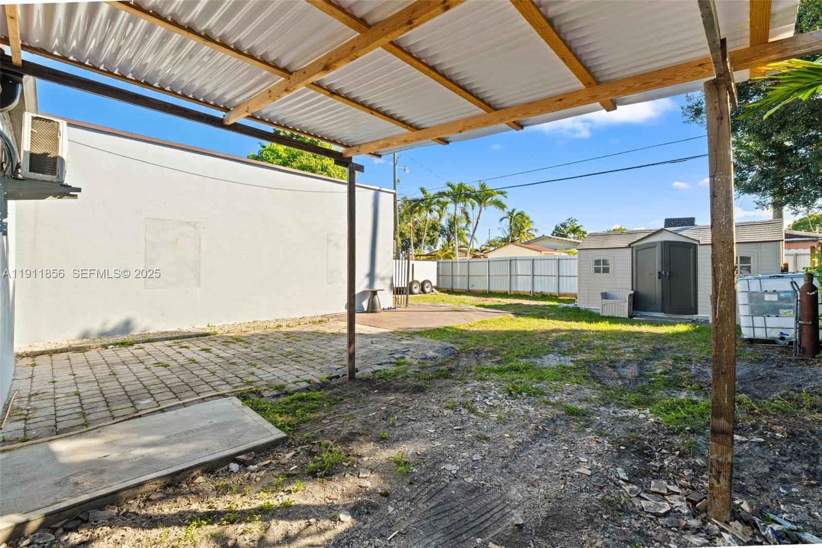580 East 44th Street Hialeah, FL 33013 - Photo 29 of 41 a view of a backyard with swimming pool