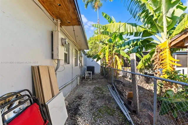 a view of a house with a street