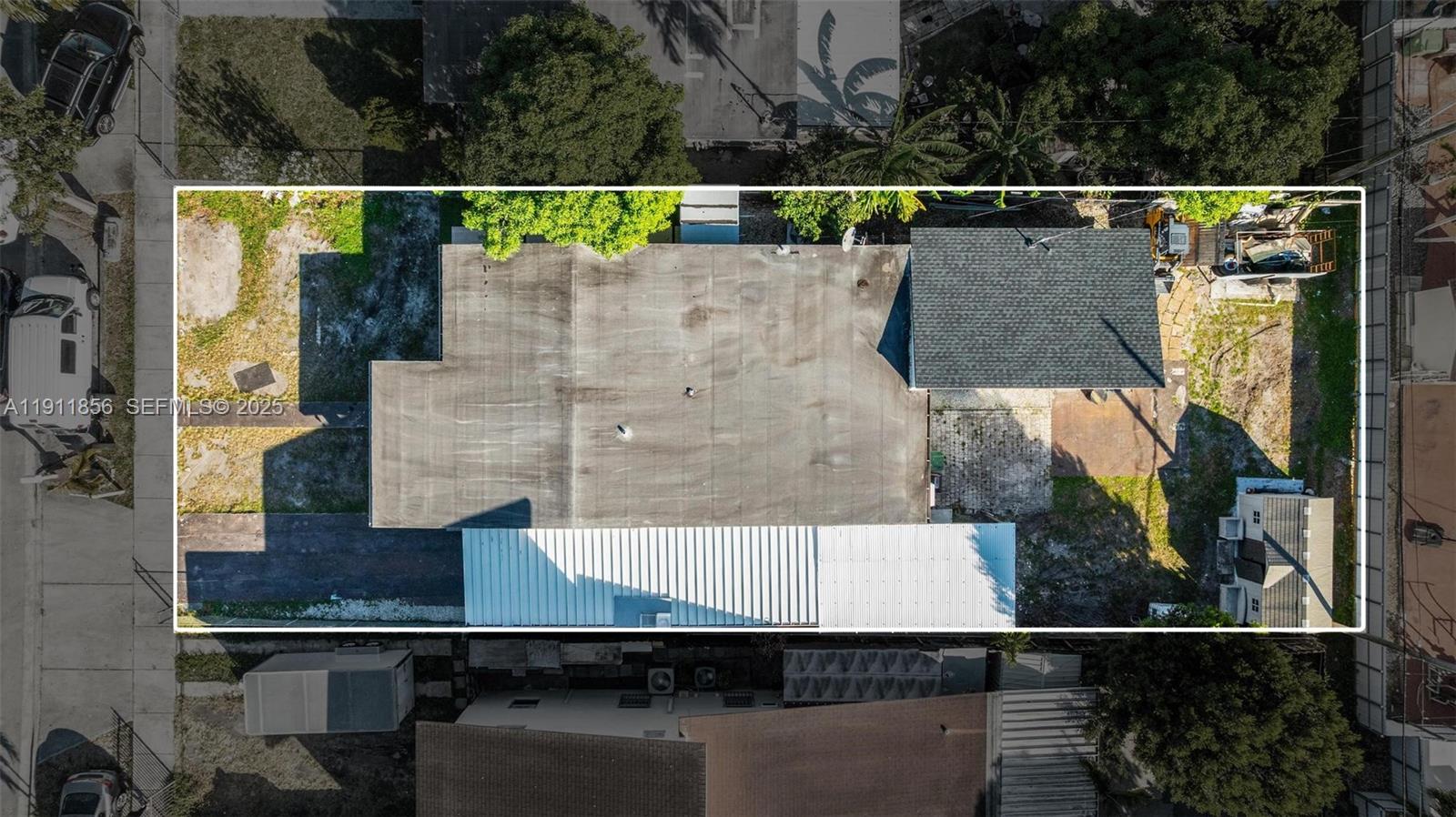 580 East 44th Street Hialeah, FL 33013 - Photo 33 of 41 an aerial view of residential houses with outdoor space