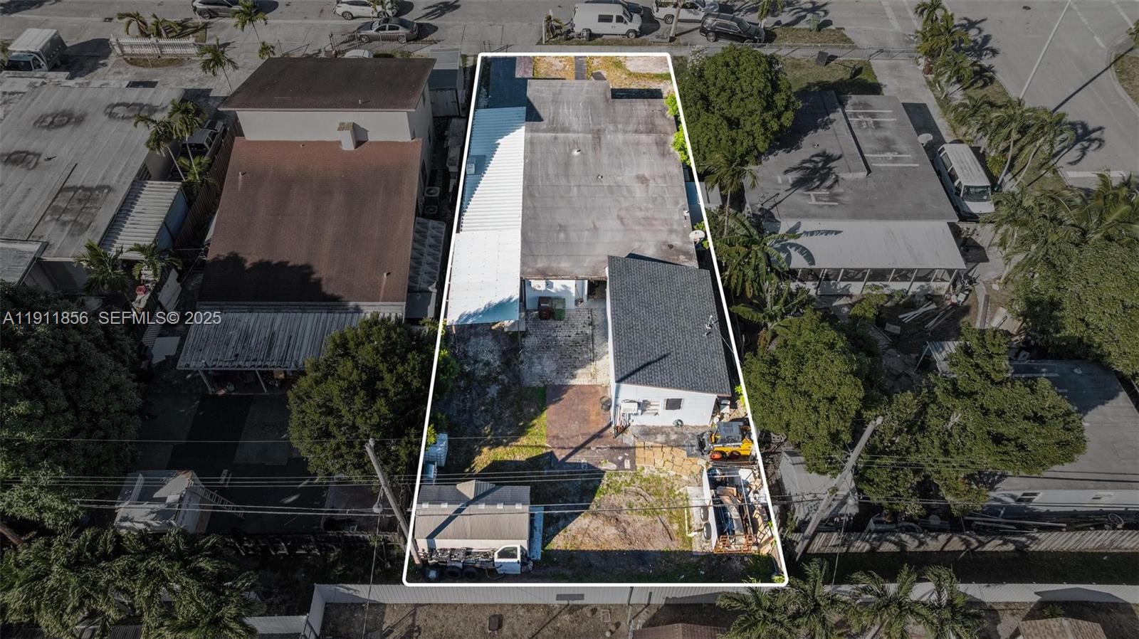 580 East 44th Street Hialeah, FL 33013 - Photo 37 of 41 an aerial view of a house with a yard and plants
