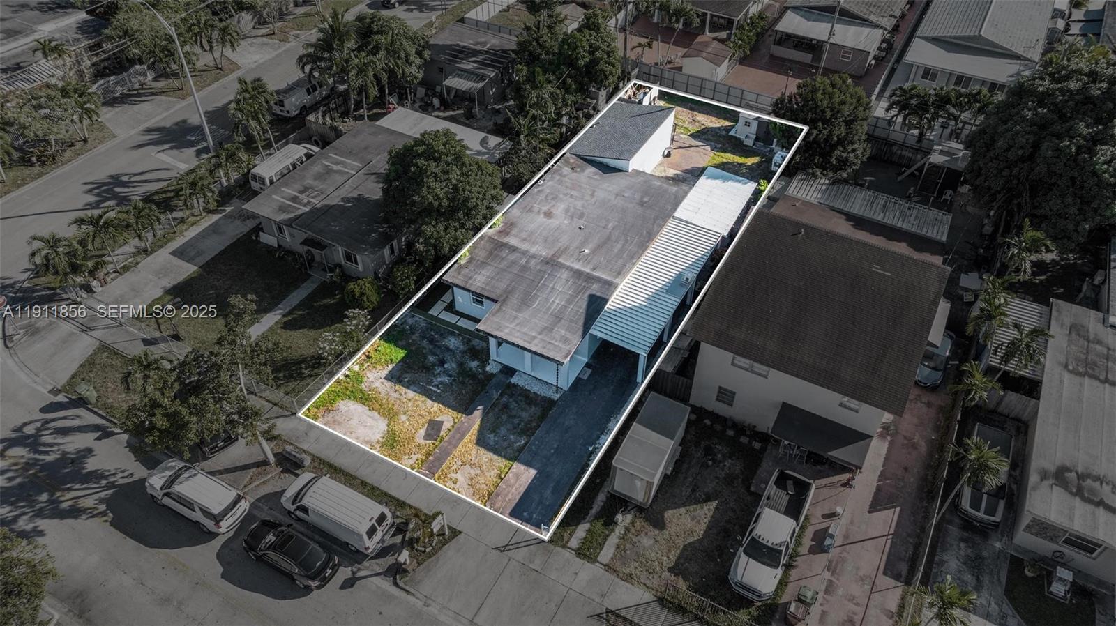 580 East 44th Street Hialeah, FL 33013 - Photo 39 of 41 an aerial view of a house with a yard