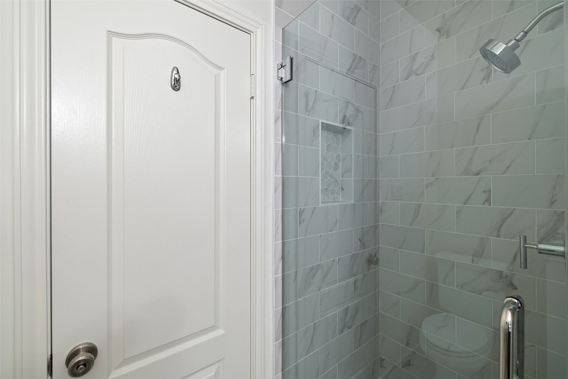 5700 Carry Back Lane Austin, TX 78746 - Photo 27 of 40 a bathroom with a shower