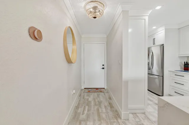 a view of a livingroom with wooden floor