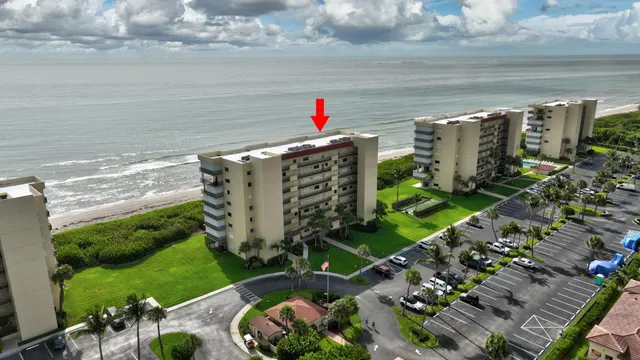 a view of a lake with a building in the background