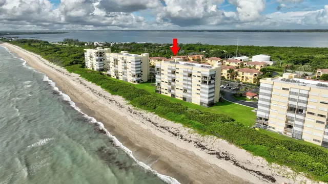 a view of a lake with a building in the background