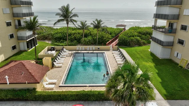 a view of swimming pool with a patio