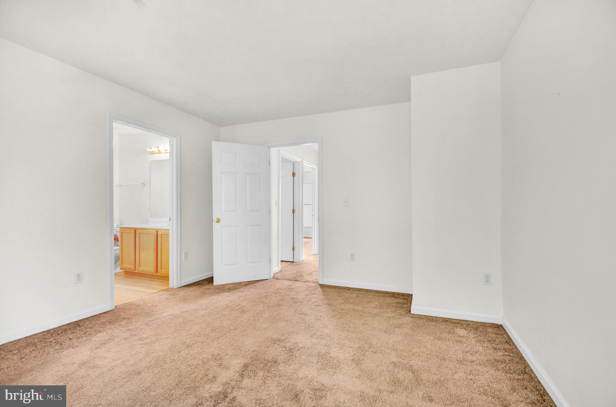 8036 Silver Fox Way Chesapeake Beach, MD 20732 - Photo 11 of 22 an empty room with an entryway
