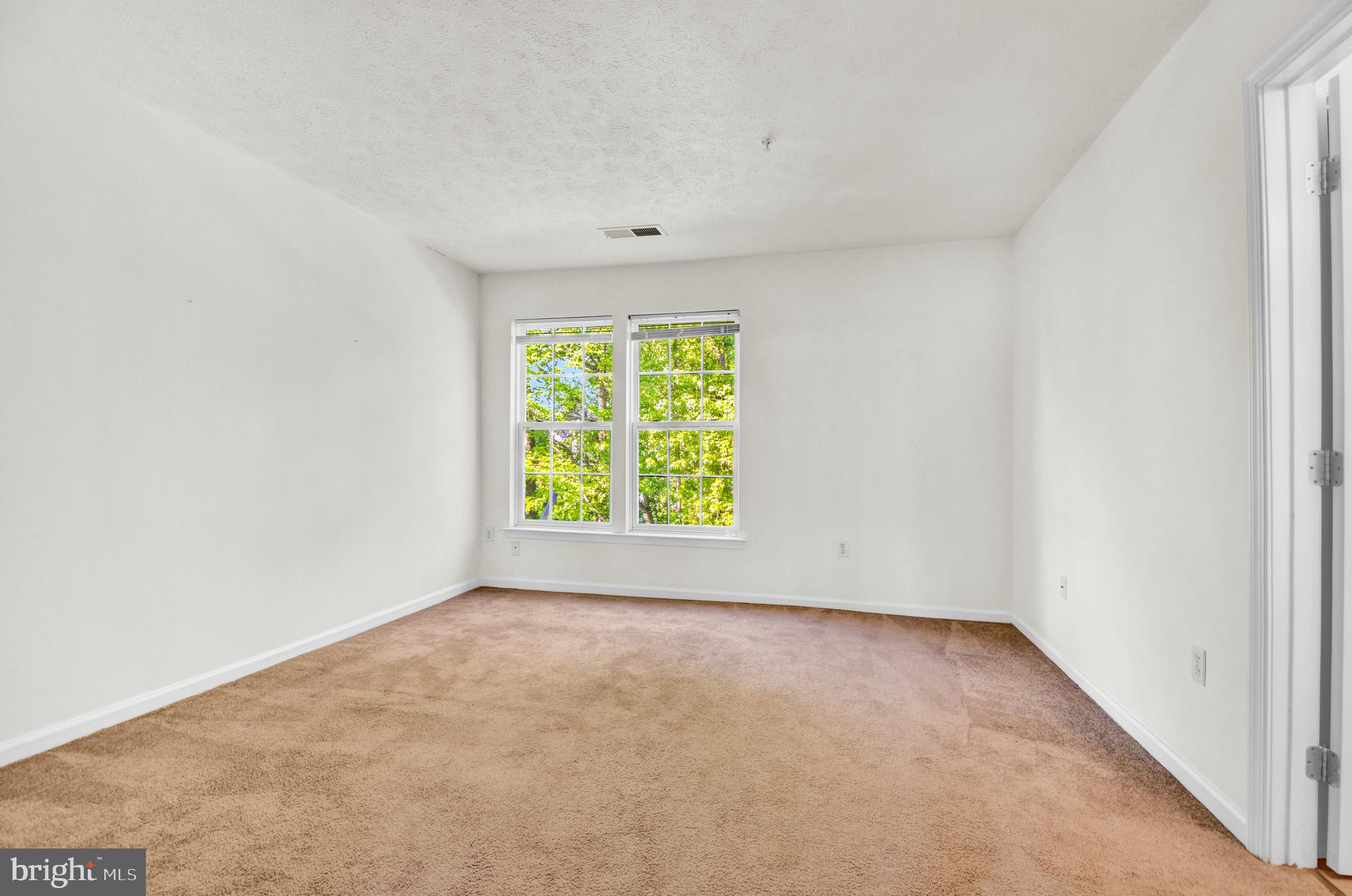 8036 Silver Fox Way Chesapeake Beach, MD 20732 - Photo 12 of 22 an empty room with window