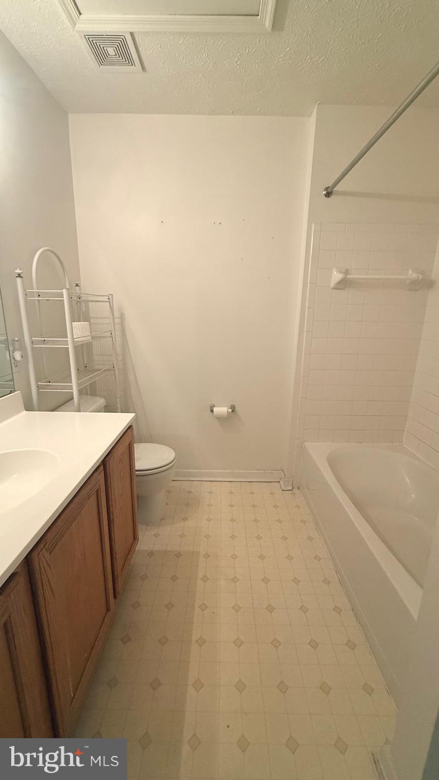 8036 Silver Fox Way Chesapeake Beach, MD 20732 - Photo 15 of 19 a bathroom with a sink a toilet and shower
