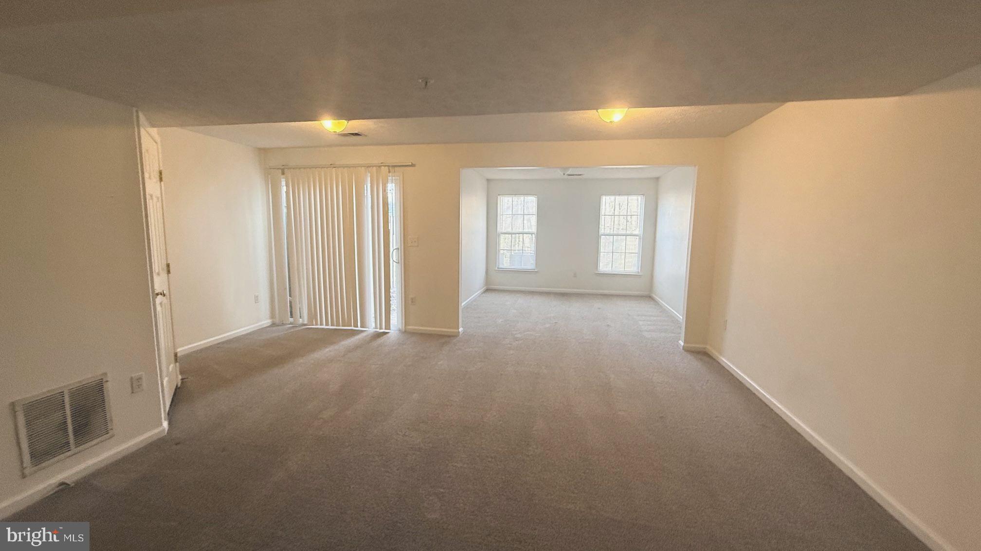 8036 Silver Fox Way Chesapeake Beach, MD 20732 - Photo 17 of 19 a view of hallway with windows