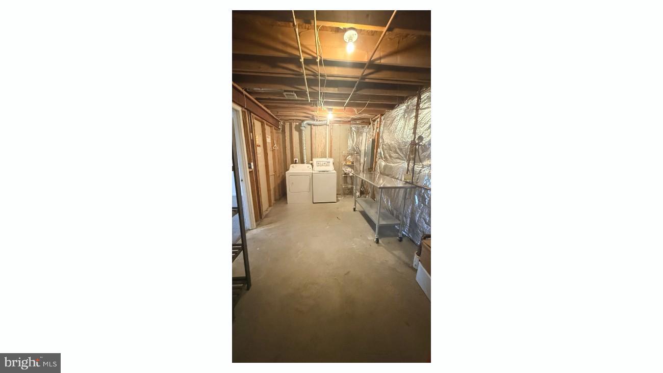 8036 Silver Fox Way Chesapeake Beach, MD 20732 - Photo 18 of 19 a close view of a room with racks on the wall