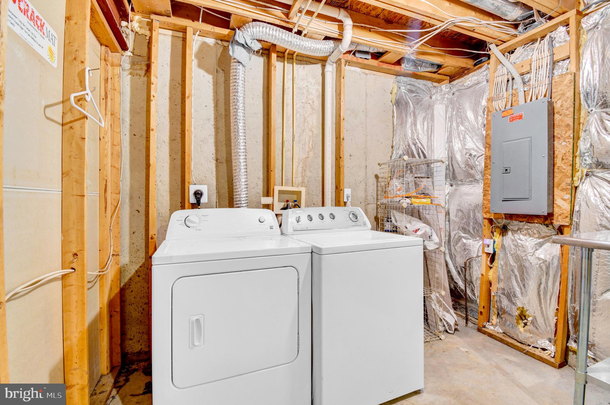 8036 Silver Fox Way Chesapeake Beach, MD 20732 - Photo 20 of 22 a utility room with dryer and washer