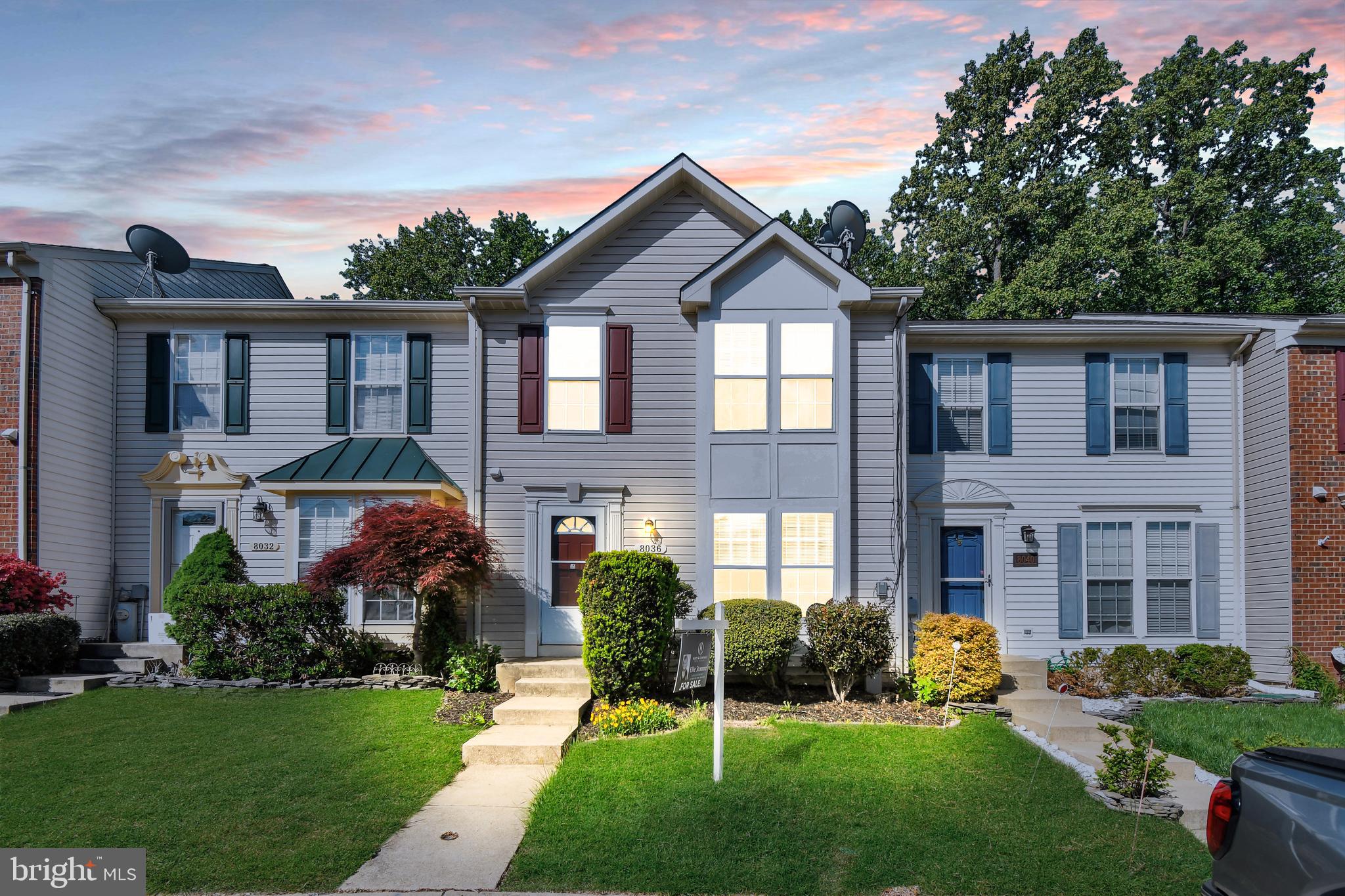 8036 Silver Fox Way Chesapeake Beach, MD 20732 - Photo 2 of 22 a front view of house with yard and green space