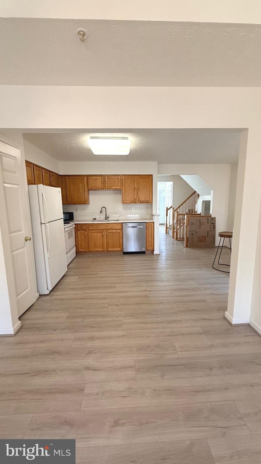 8036 Silver Fox Way Chesapeake Beach, MD 20732 - Photo 5 of 19 a living room with furniture and a wooden floor