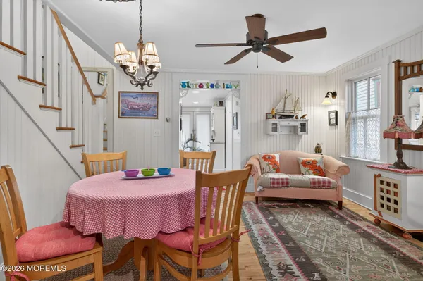 a kitchen with stainless steel appliances granite countertop a refrigerator and a stove