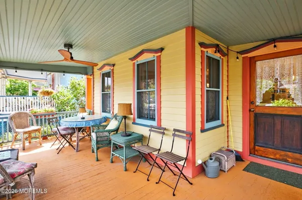 a bedroom with a bed and a flat tv screen
