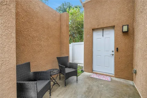 a building outdoor space with patio furniture