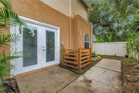 a view of a two couches in the back yard