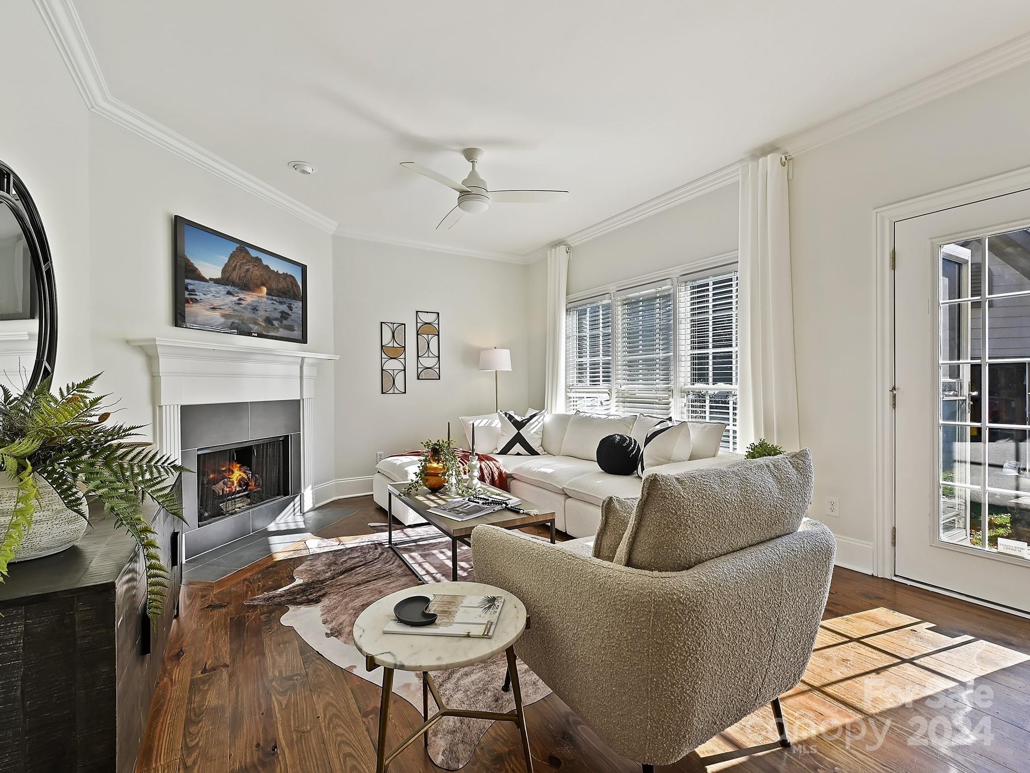 820 Millbrook Road Charlotte, NC 28211 - Photo 14 of 31 a living room with furniture and a fireplace