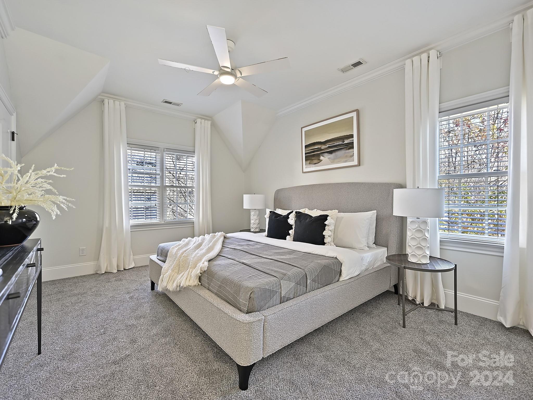 820 Millbrook Road Charlotte, NC 28211 - Photo 19 of 31 a bed room with a bed and a chair