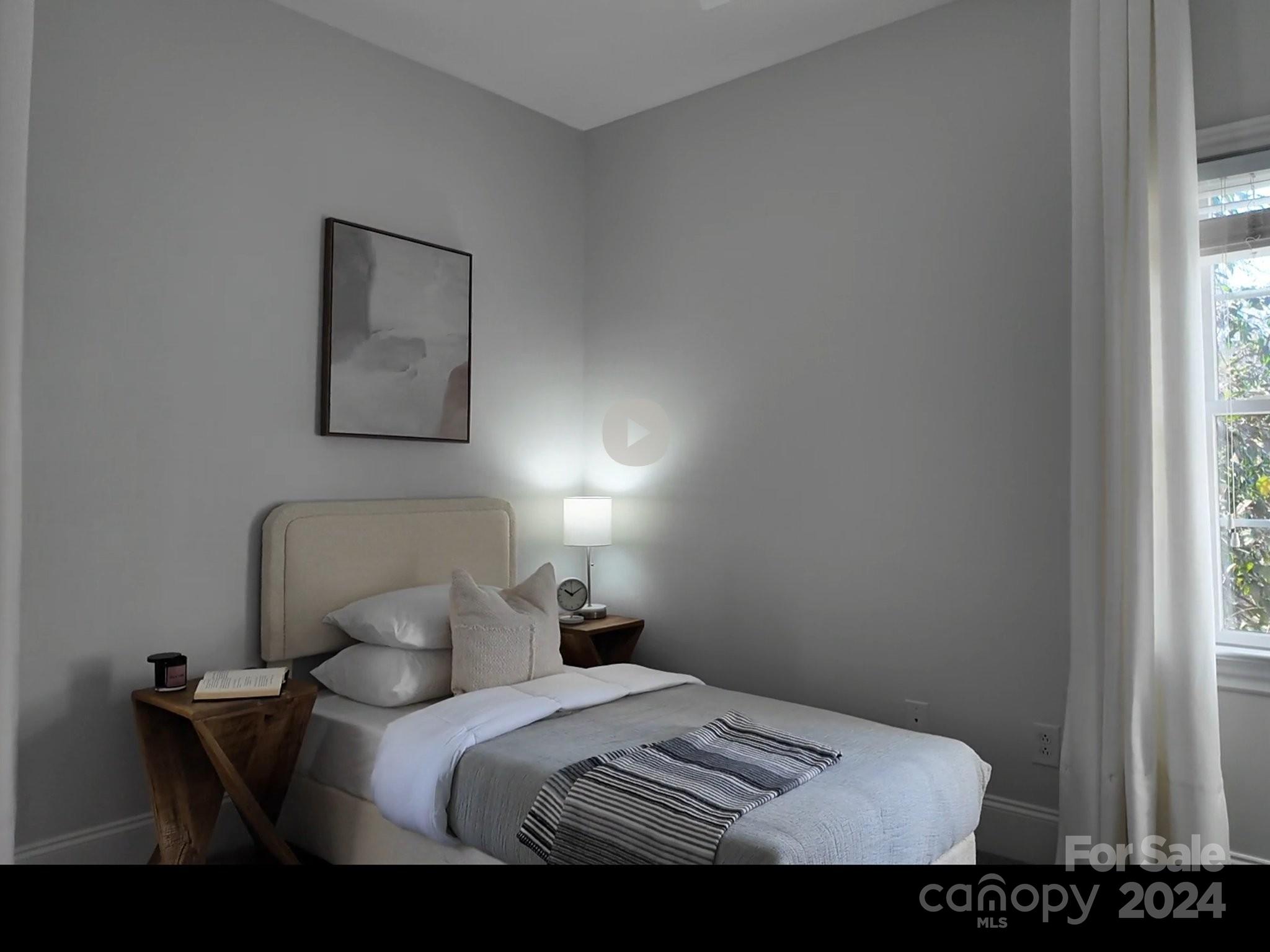 820 Millbrook Road Charlotte, NC 28211 - Photo 26 of 31 a bedroom with a bed and a window