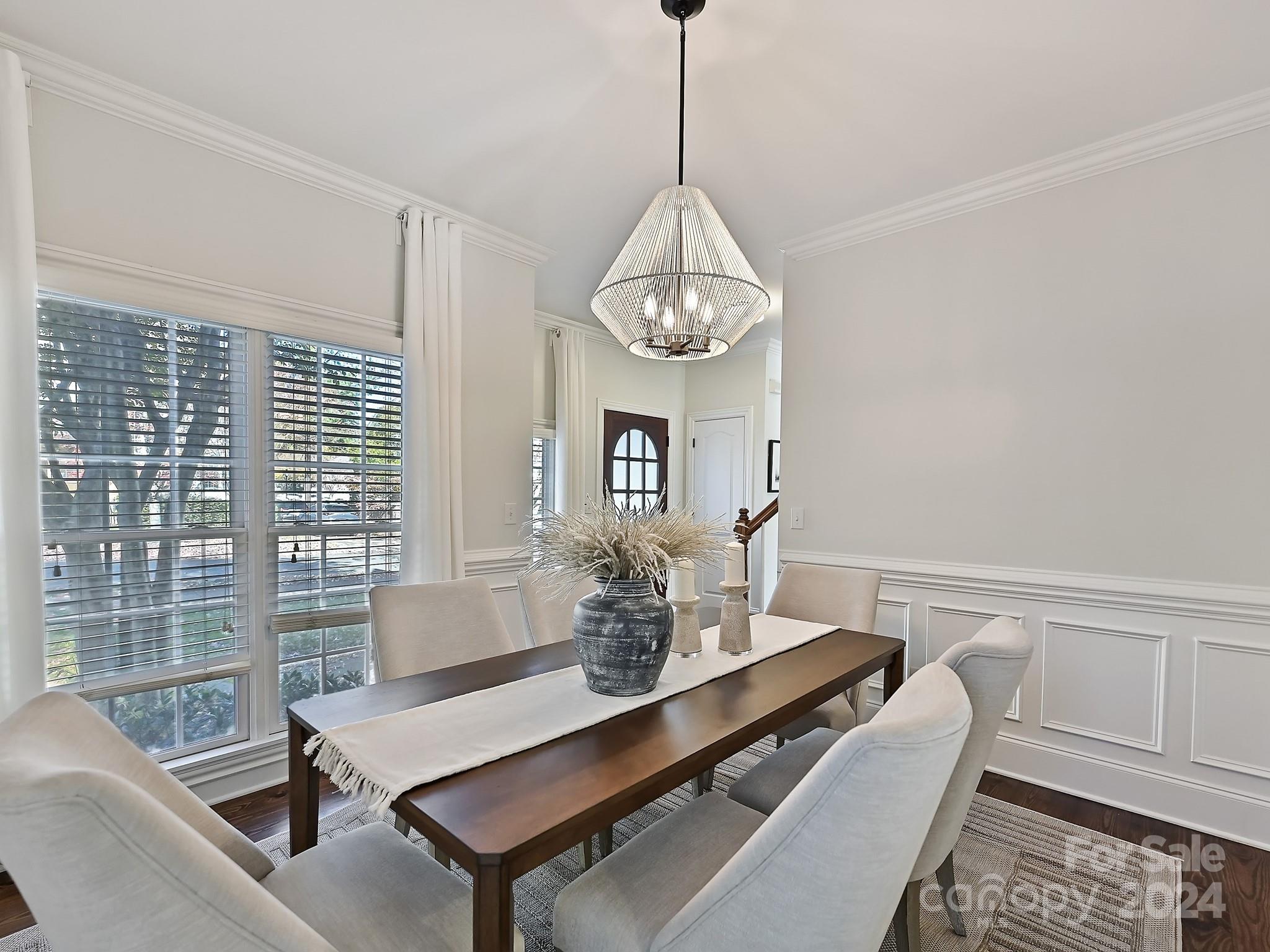 820 Millbrook Road Charlotte, NC 28211 - Photo 4 of 31 a view of a dining room with furniture window and wooden floor