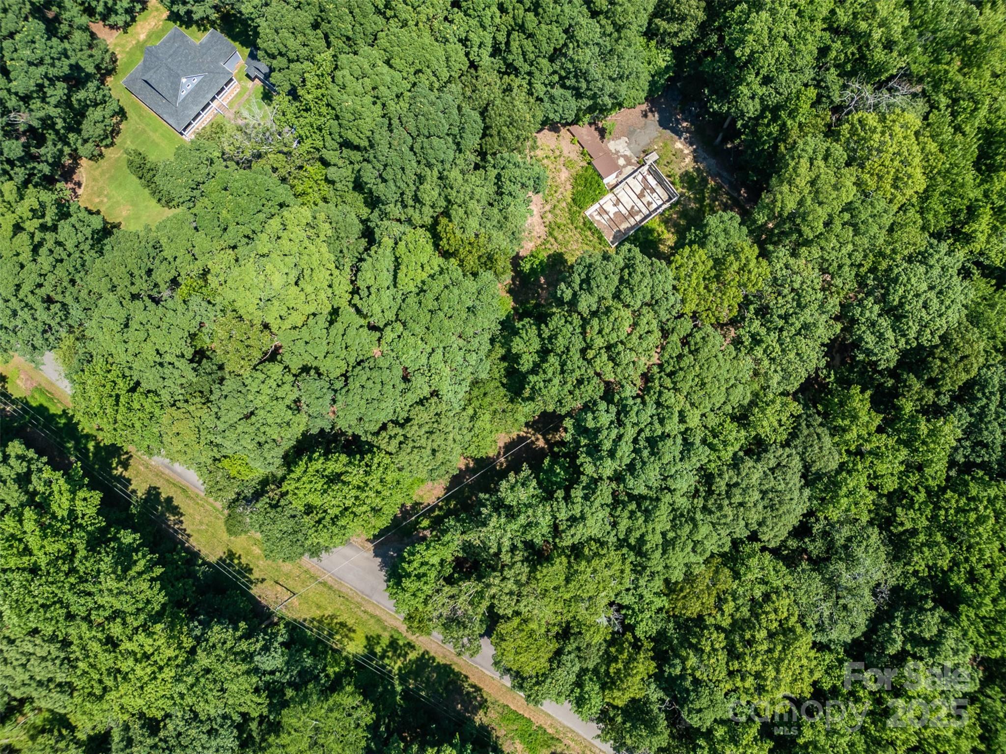 2300 Patterson Road Clover, SC 29710 - Photo 1 of 16 an aerial view of residential house with outdoor space and trees all around