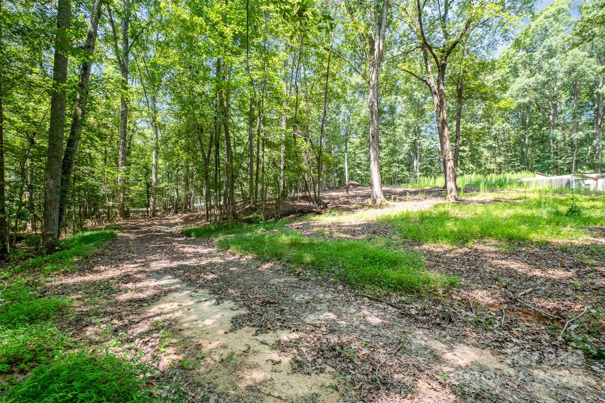 2300 Patterson Road Clover, SC 29710 - Photo 13 of 16 a backyard of a house with lots of green space