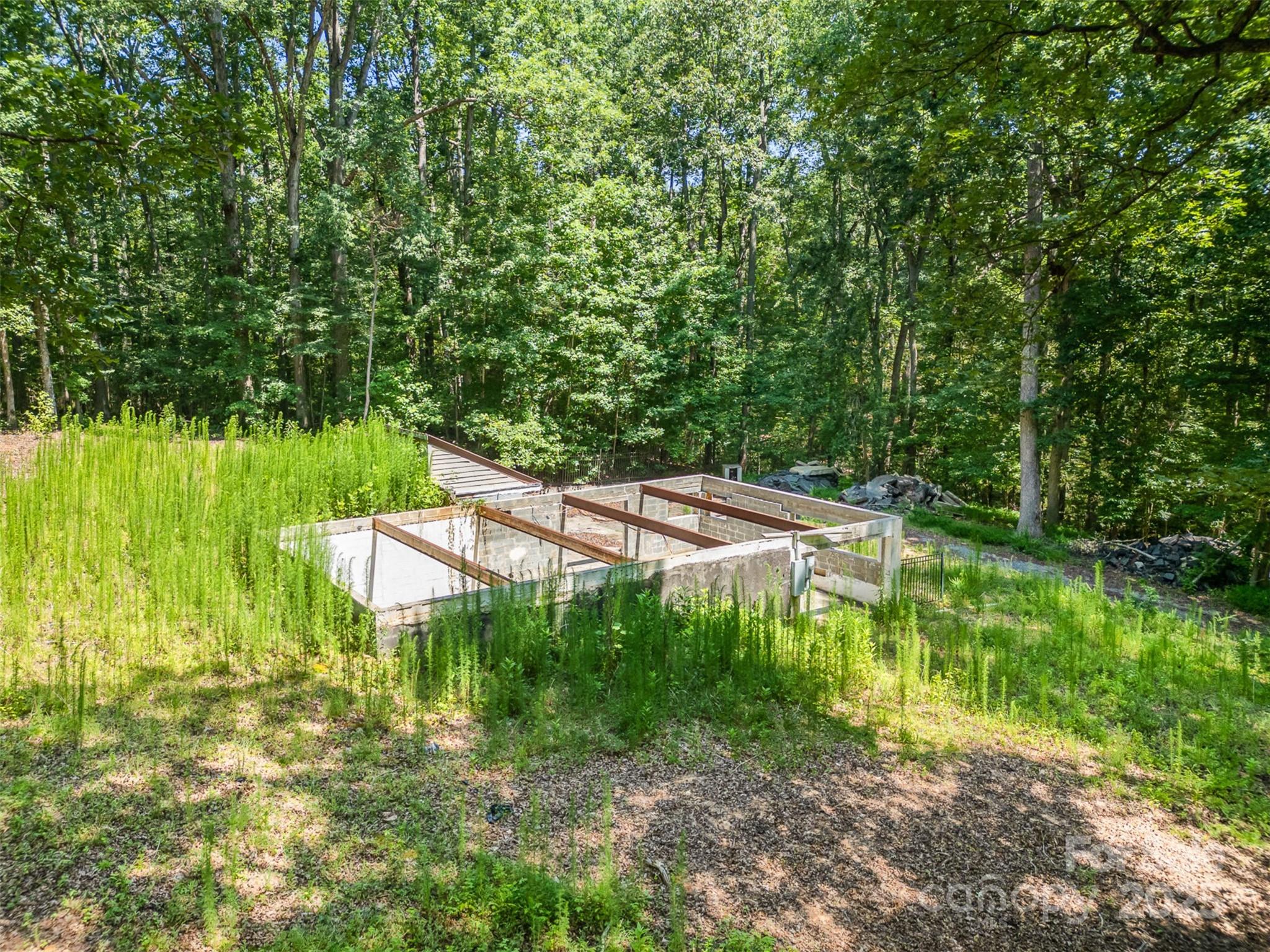 2300 Patterson Road Clover, SC 29710 - Photo 5 of 16 a backyard of a house with yard and outdoor seating