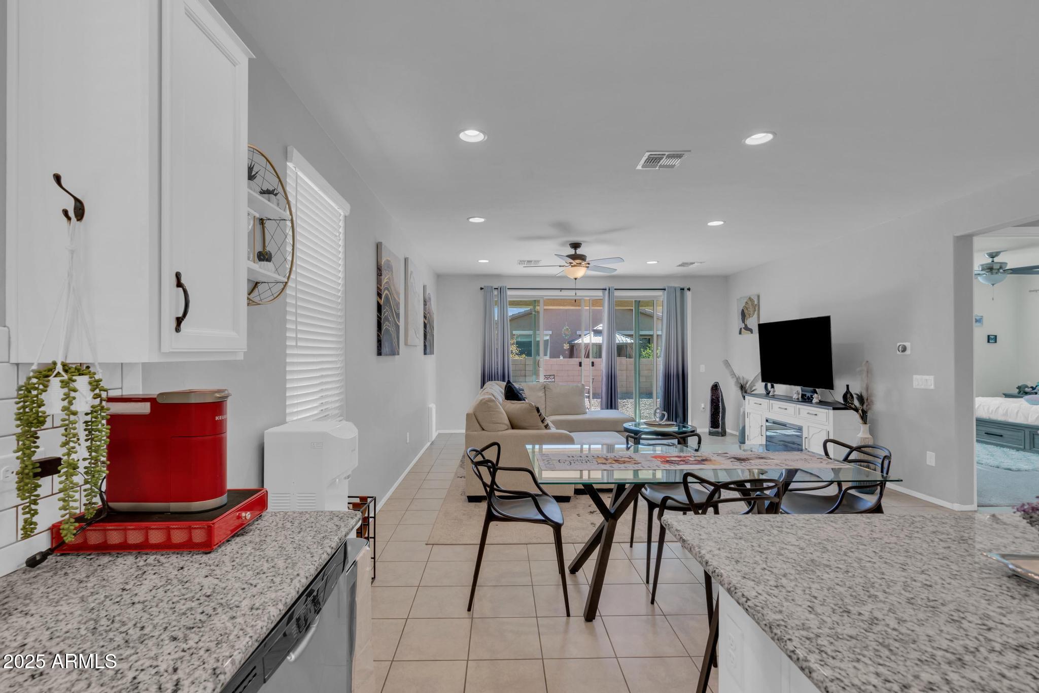 6556 East Via Arroyo Azul Tucson, AZ 85756 - Photo 22 of 75 a view of a dining room with furniture